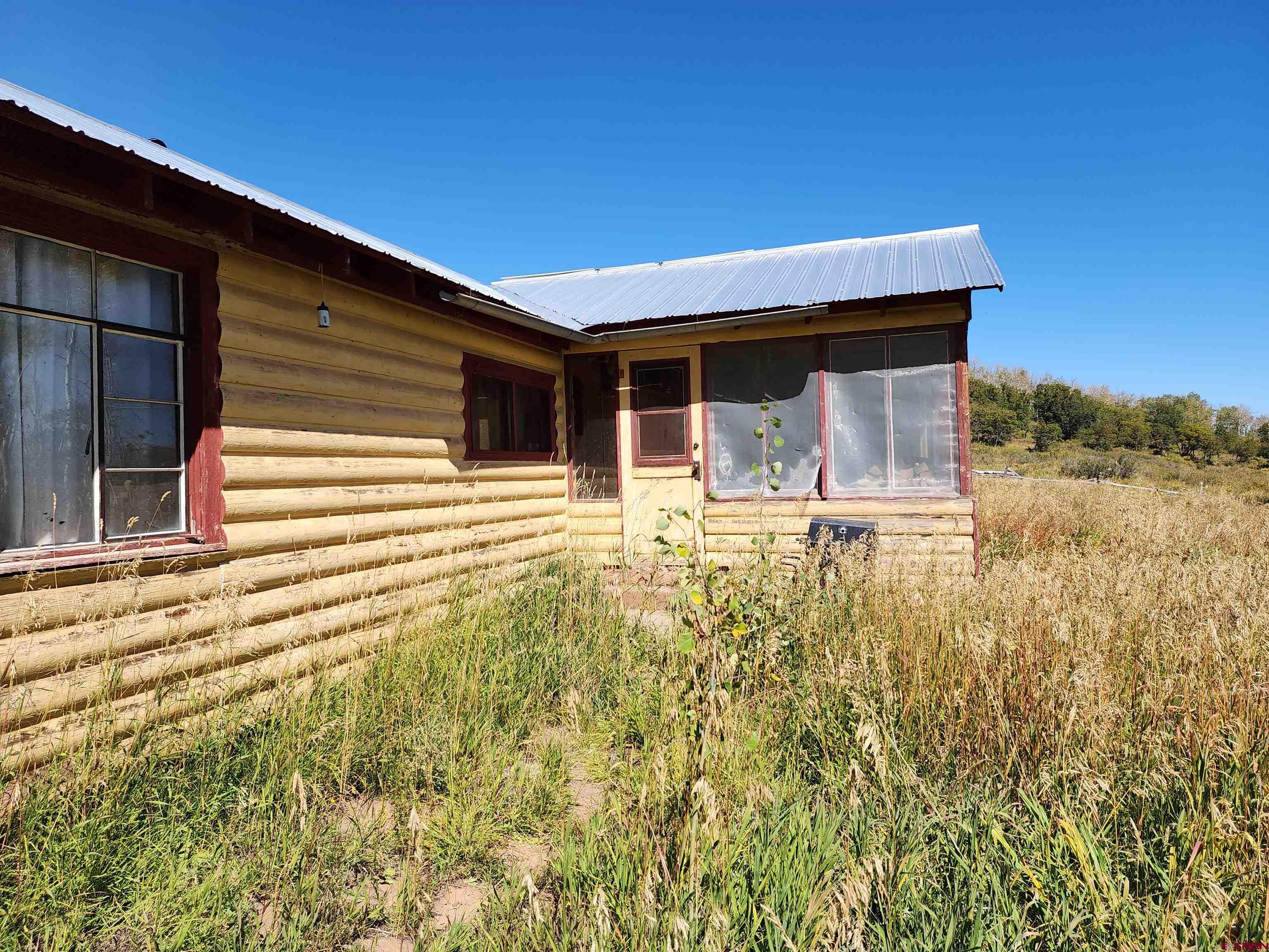 2586 26 1/10 Road Whitewater, CO 81527 - Photo 28 of 45 a view of house with backyard