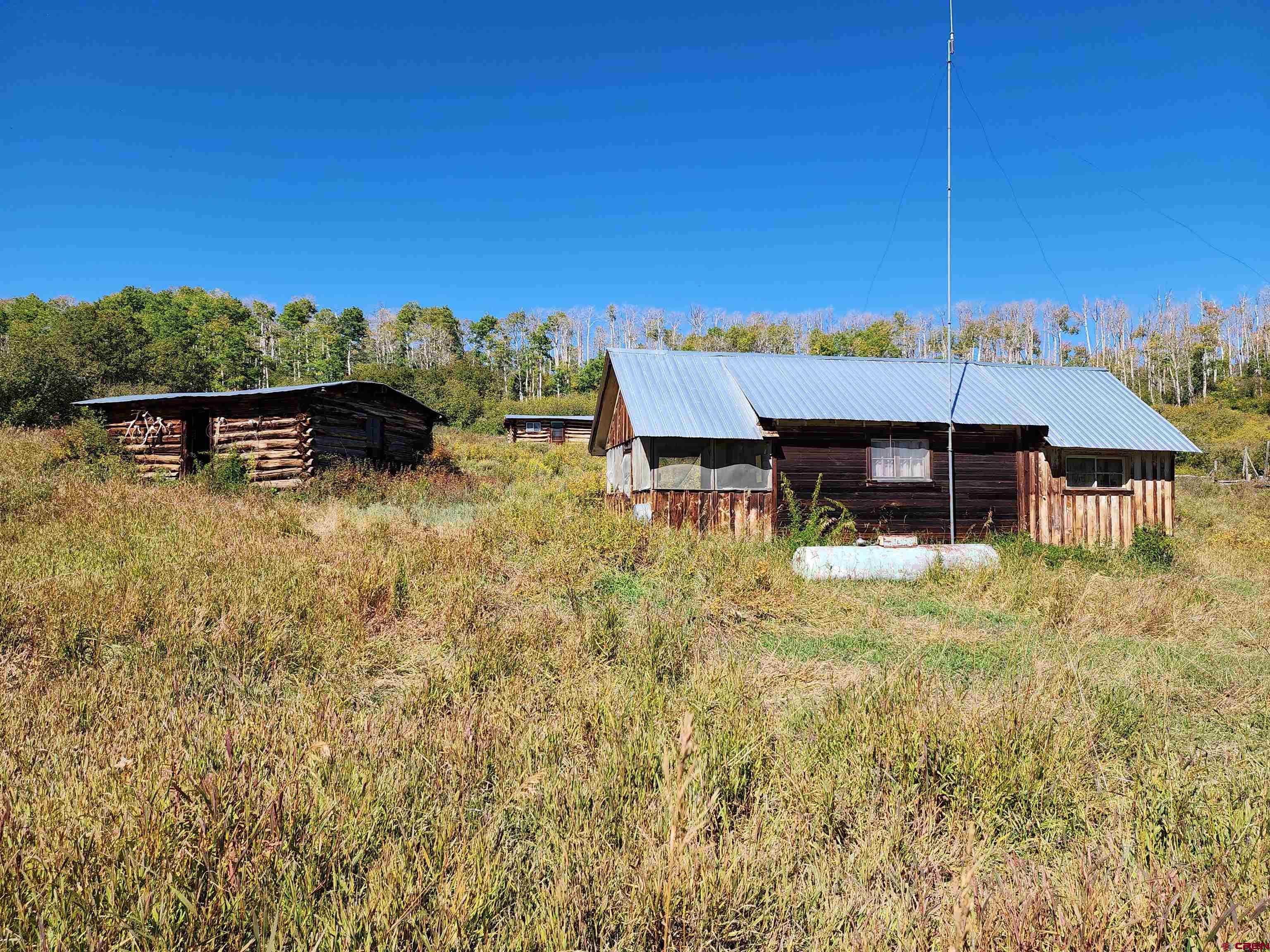 2586 26 1/10 Road Whitewater, CO 81527 - Photo 7 of 45 a view of a house with a yard balcony and sitting area