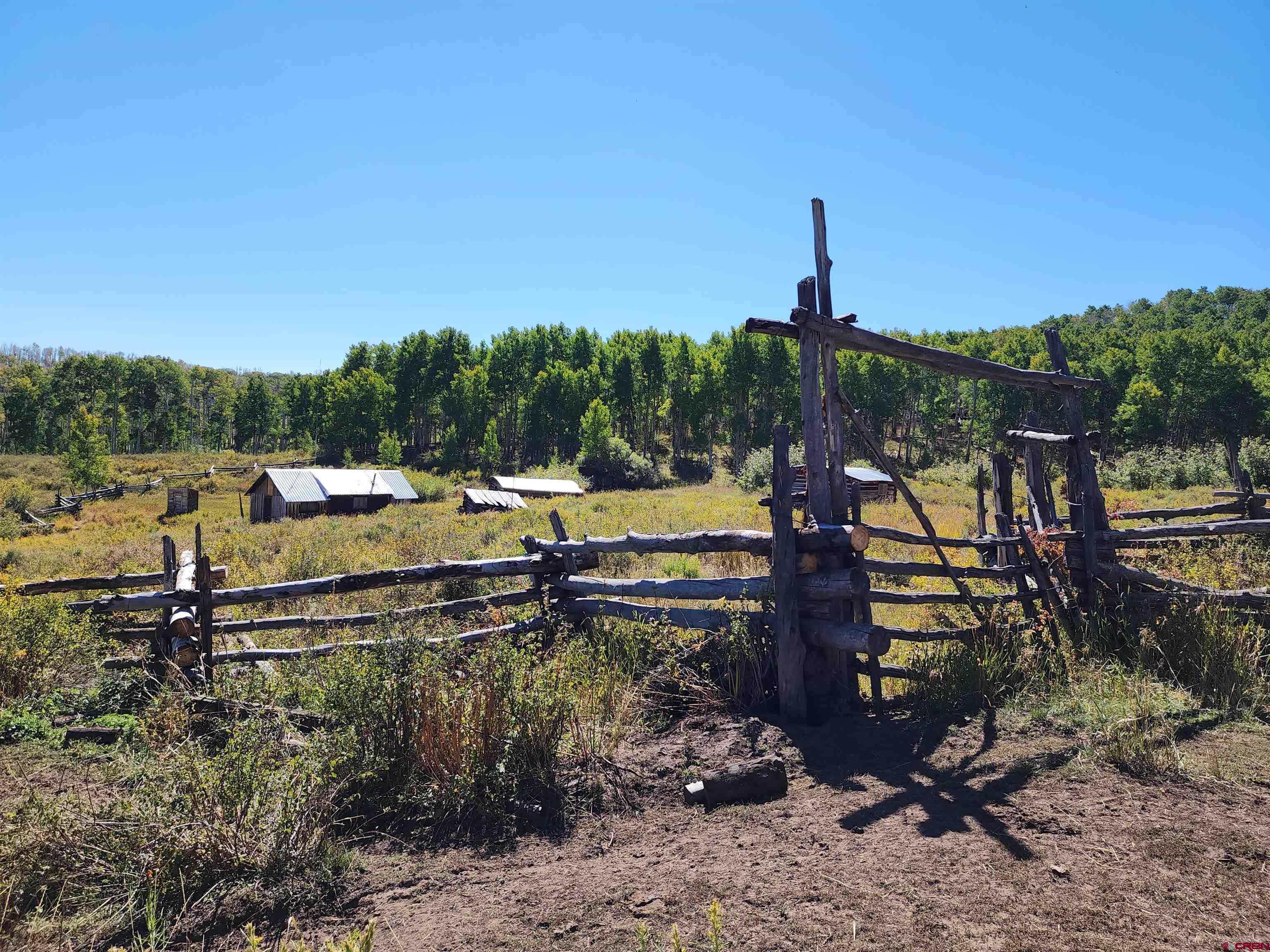 2586 26 1/10 Road Whitewater, CO 81527 - Photo 8 of 45 a view of a lake with a mountain in the background