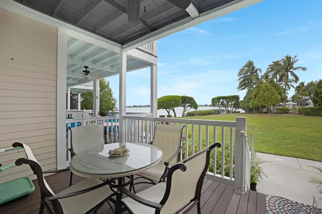 a view of a chairs and table in patio