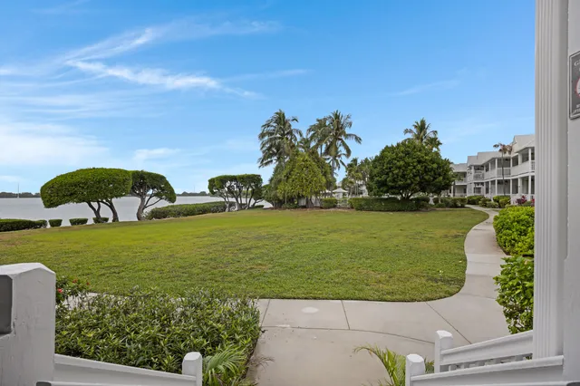a view of balcony with two chairs and a table