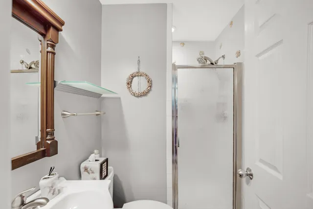 a view of a livingroom with furniture and window