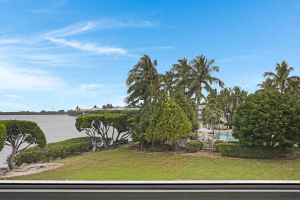 a view of a balcony with furniture