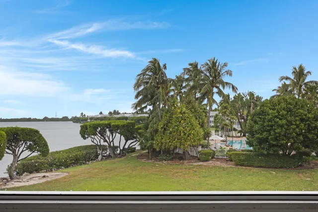 a view of a balcony with furniture