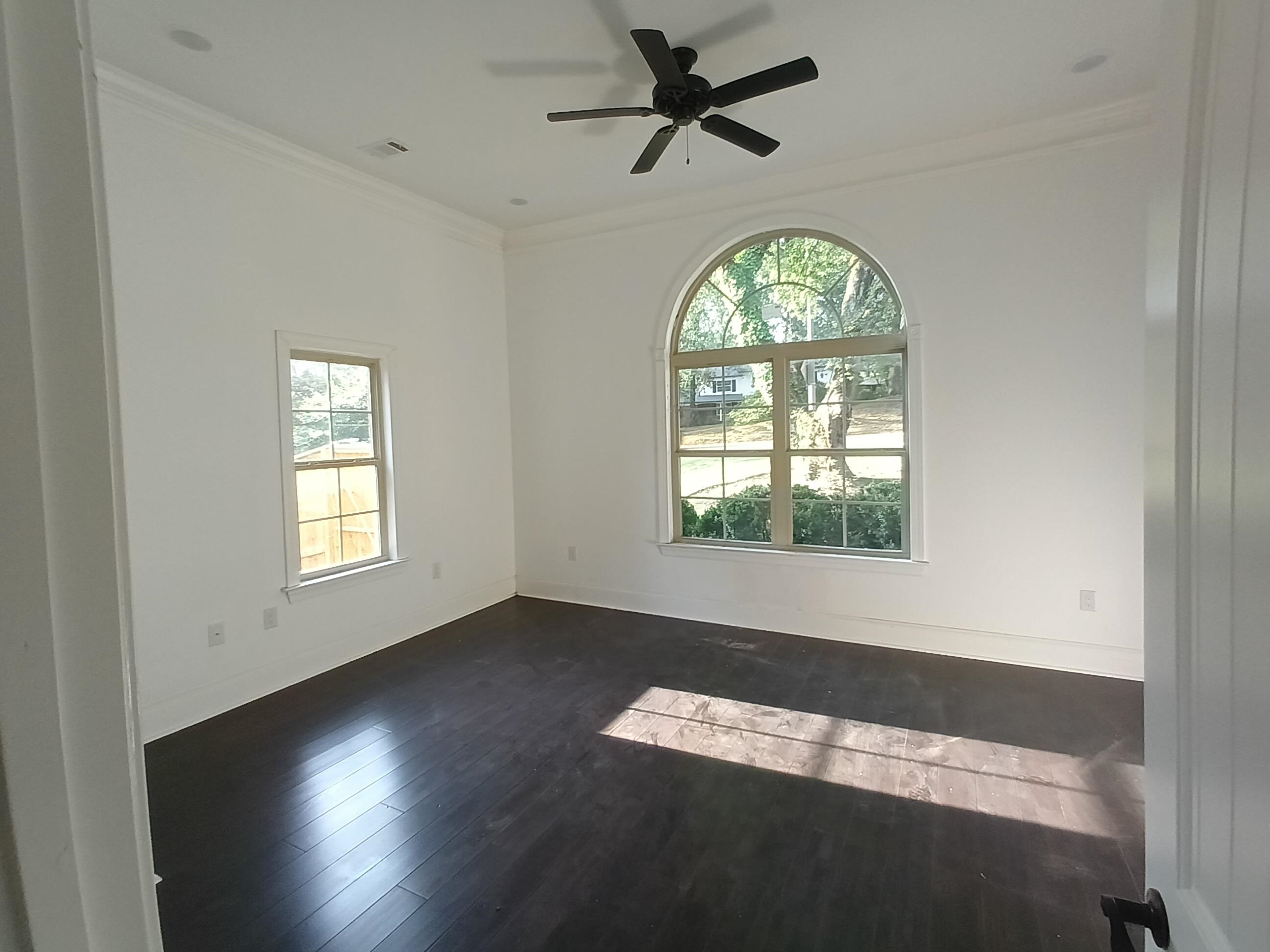 5690 Walnut Grove Road Memphis, TN 38120 - Photo 37 of 40 a view of an empty room with a window
