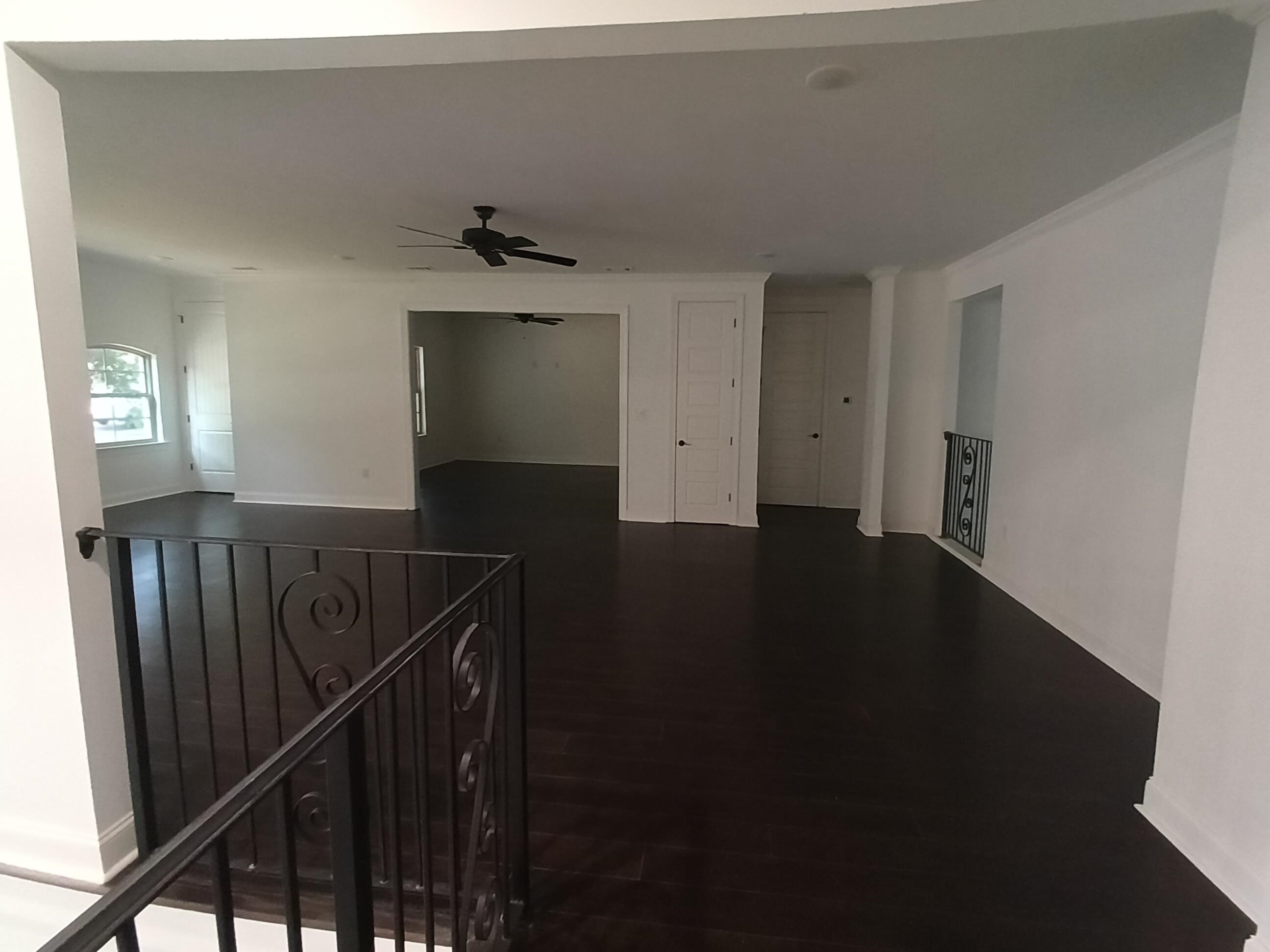 5690 Walnut Grove Road Memphis, TN 38120 - Photo 9 of 40 a view of a hallway with stairs