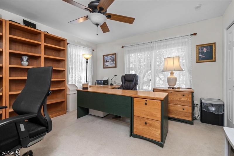15 Bracken Hill Road Hamburg, NJ 07419 - Photo 26 of 44 a view of a workspace with furniture and a window