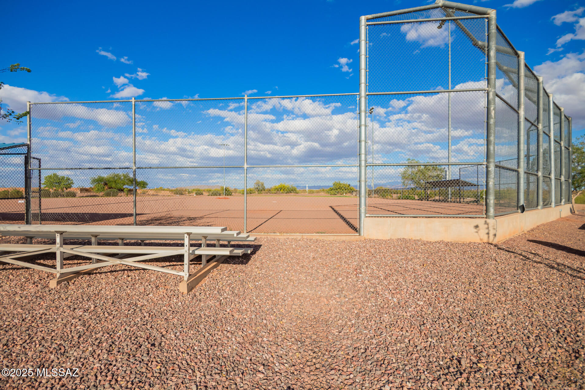 20950 East Frontier Road Red Rock, AZ 85145 - Photo 42 of 44 a view of a swimming pool with a lounge chairs