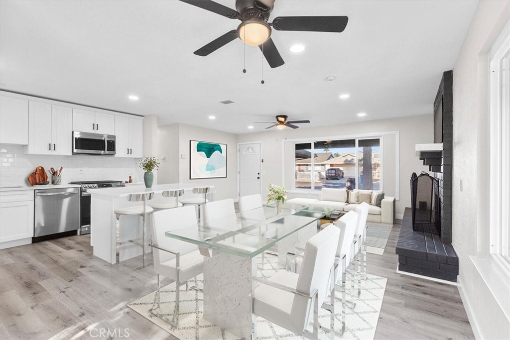 7900 Temecula Place Riverside, CA 92503 - Photo 3 of 22 a view of kitchen with cabinets and stainless steel appliances