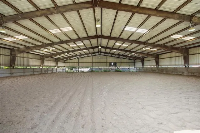 a view of a swimming pool with a lake view