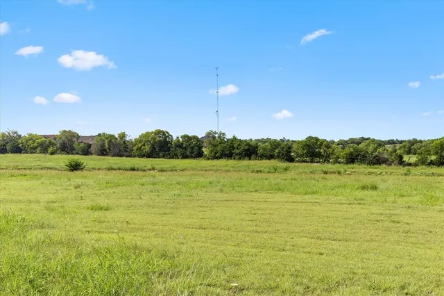 a view of a big yard next to a building