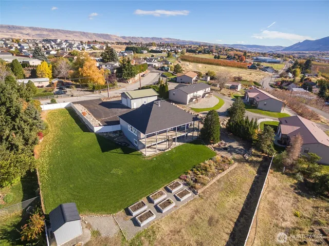 an aerial view of a house with a outdoor space