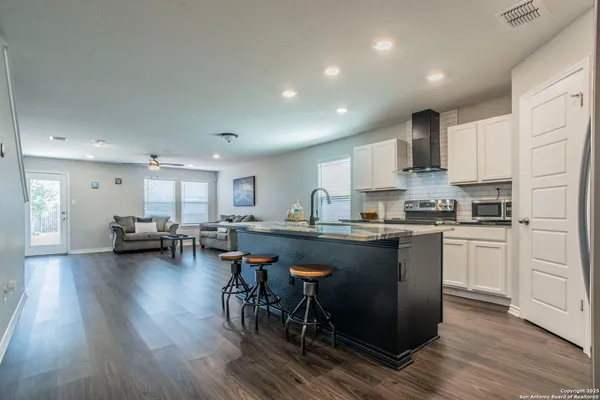 a bedroom with a bed and dresser