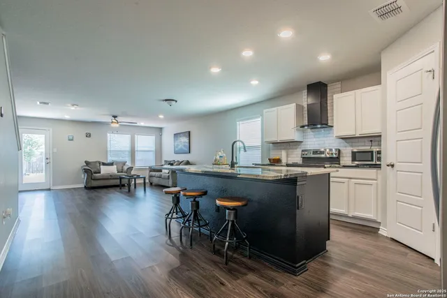 a bedroom with a bed and dresser