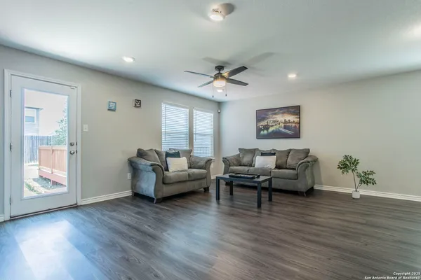 a view of a chairs on the roof deck