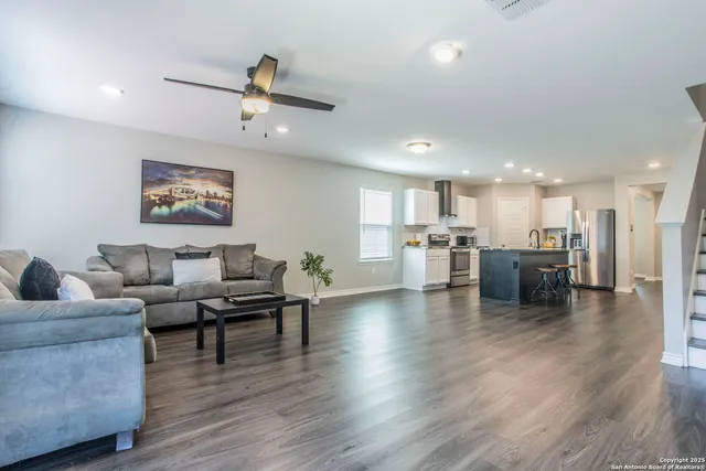 a kitchen with a refrigerator and a microwave