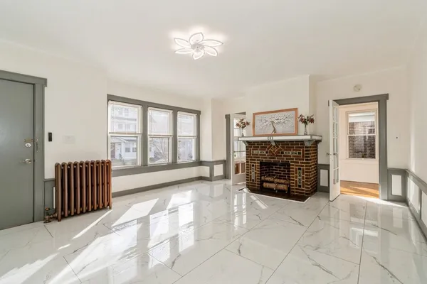 a view of livingroom with furniture and fireplace