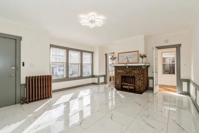 a view of livingroom with furniture and fireplace