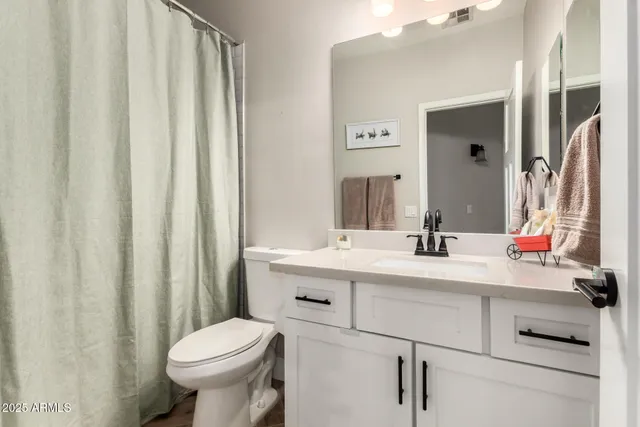 a bedroom with a bed