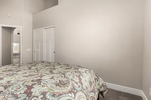 a kitchen with a refrigerator and cabinets