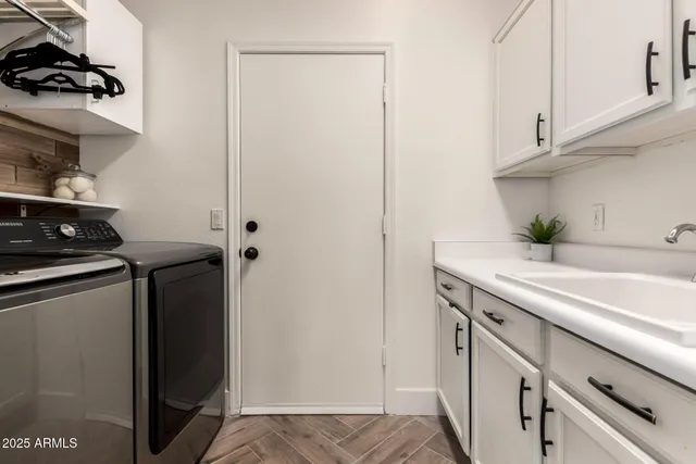 a view of a lake with a house in the background