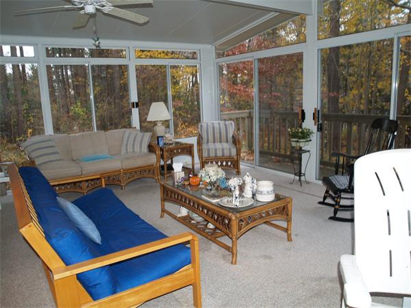 6 Pomfret Road Chelmsford, MA 01824 - Photo 2 of 14 a living room with furniture and a floor to ceiling window