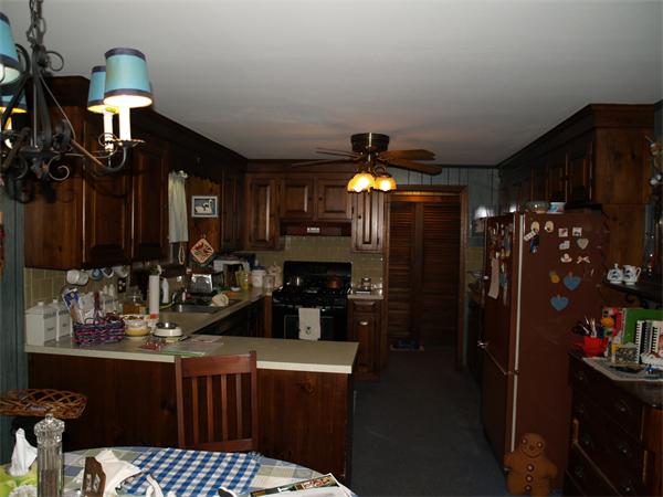 6 Pomfret Road Chelmsford, MA 01824 - Photo 3 of 14 a kitchen with a sink cabinets and window