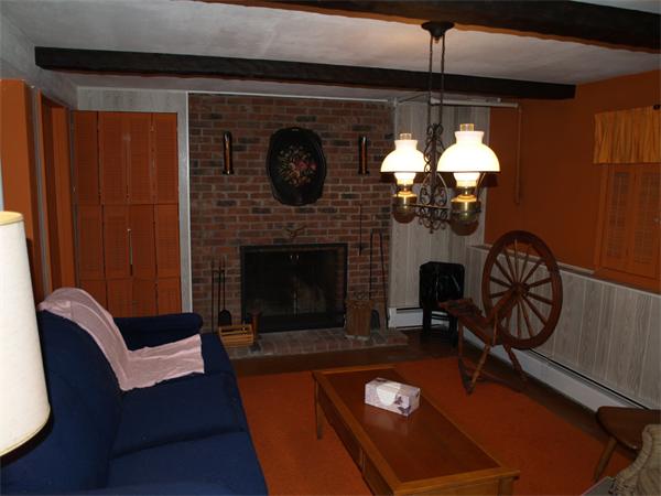 6 Pomfret Road Chelmsford, MA 01824 - Photo 4 of 14 a living room with furniture and a fireplace