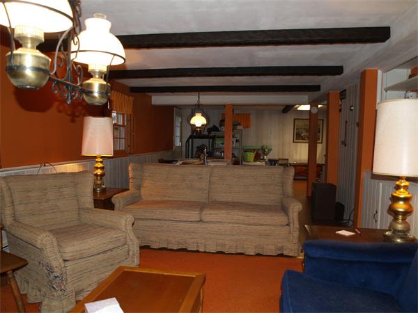 6 Pomfret Road Chelmsford, MA 01824 - Photo 5 of 14 a living room with furniture and a chandelier
