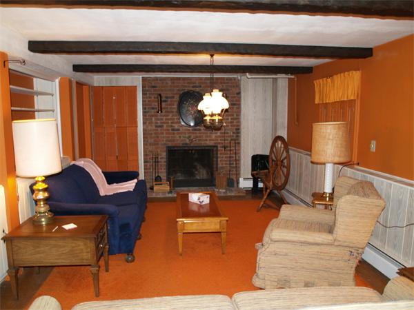 6 Pomfret Road Chelmsford, MA 01824 - Photo 6 of 14 a living room with furniture and a fireplace