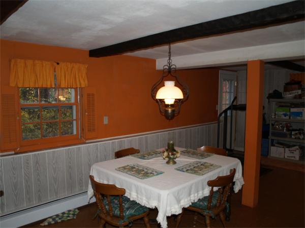 6 Pomfret Road Chelmsford, MA 01824 - Photo 7 of 14 a view of a dining room with furniture and wooden floor