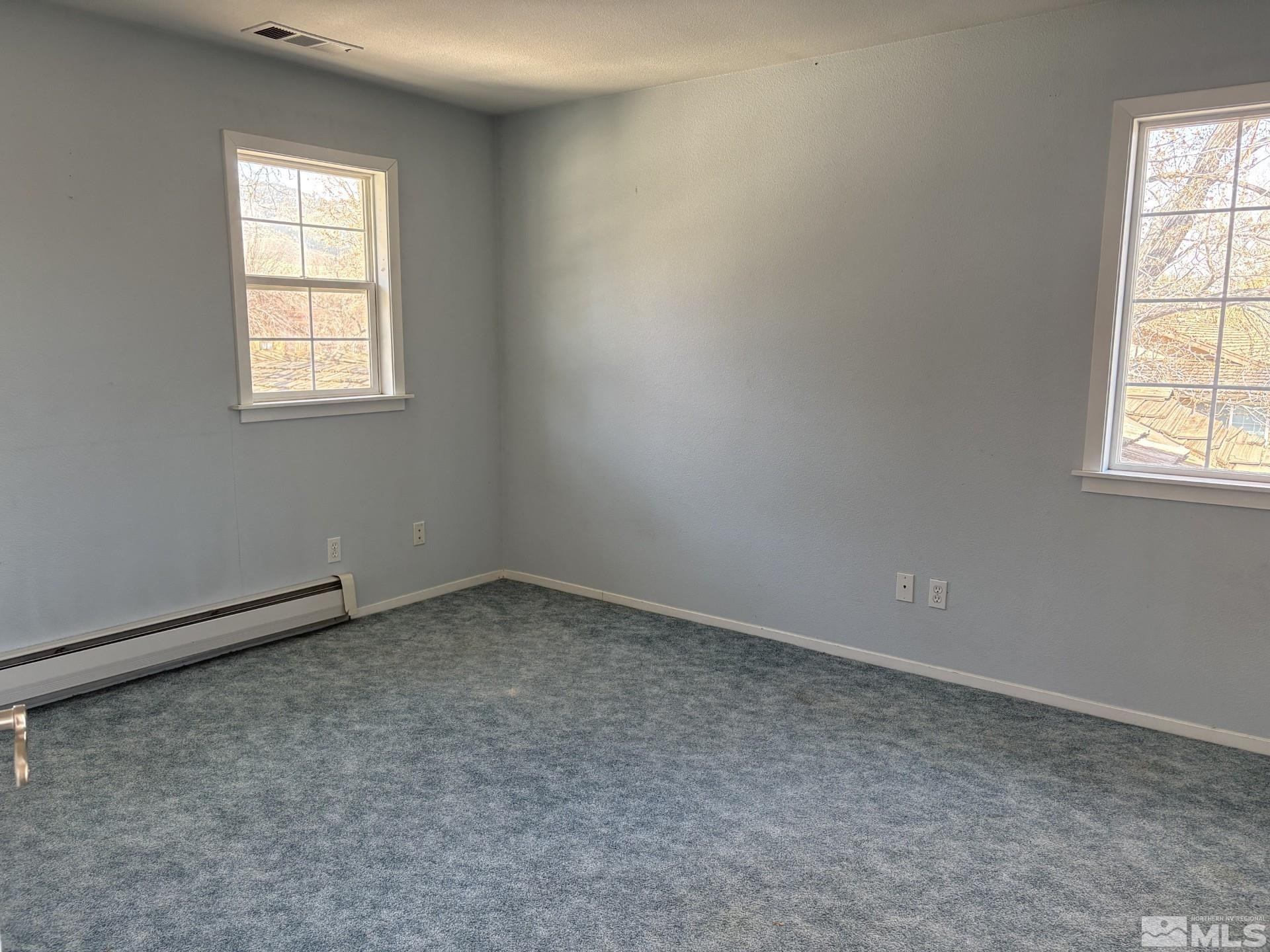 3 Comstock Circle Carson City, NV 89703 - Photo 22 of 30 an empty room with a window