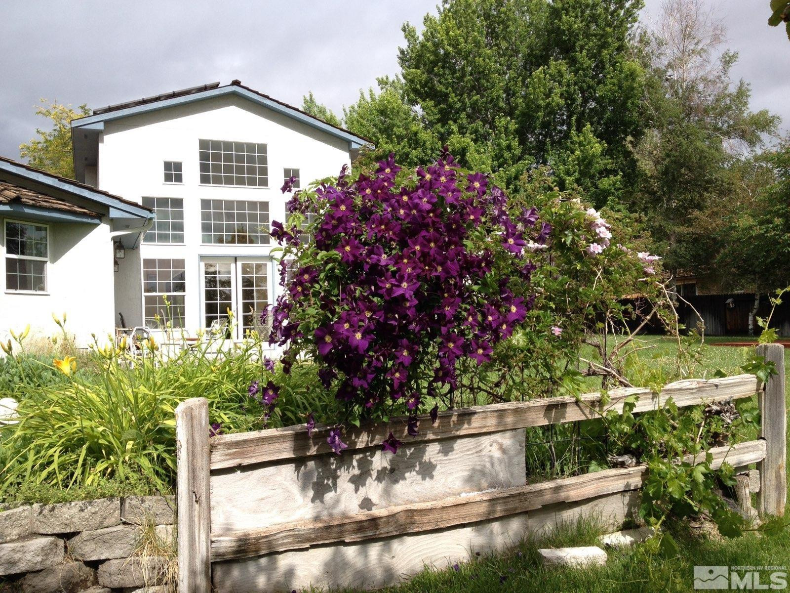 3 Comstock Circle Carson City, NV 89703 - Photo 28 of 30 a front view of a house with a yard