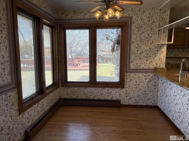 a view of hallway with windows