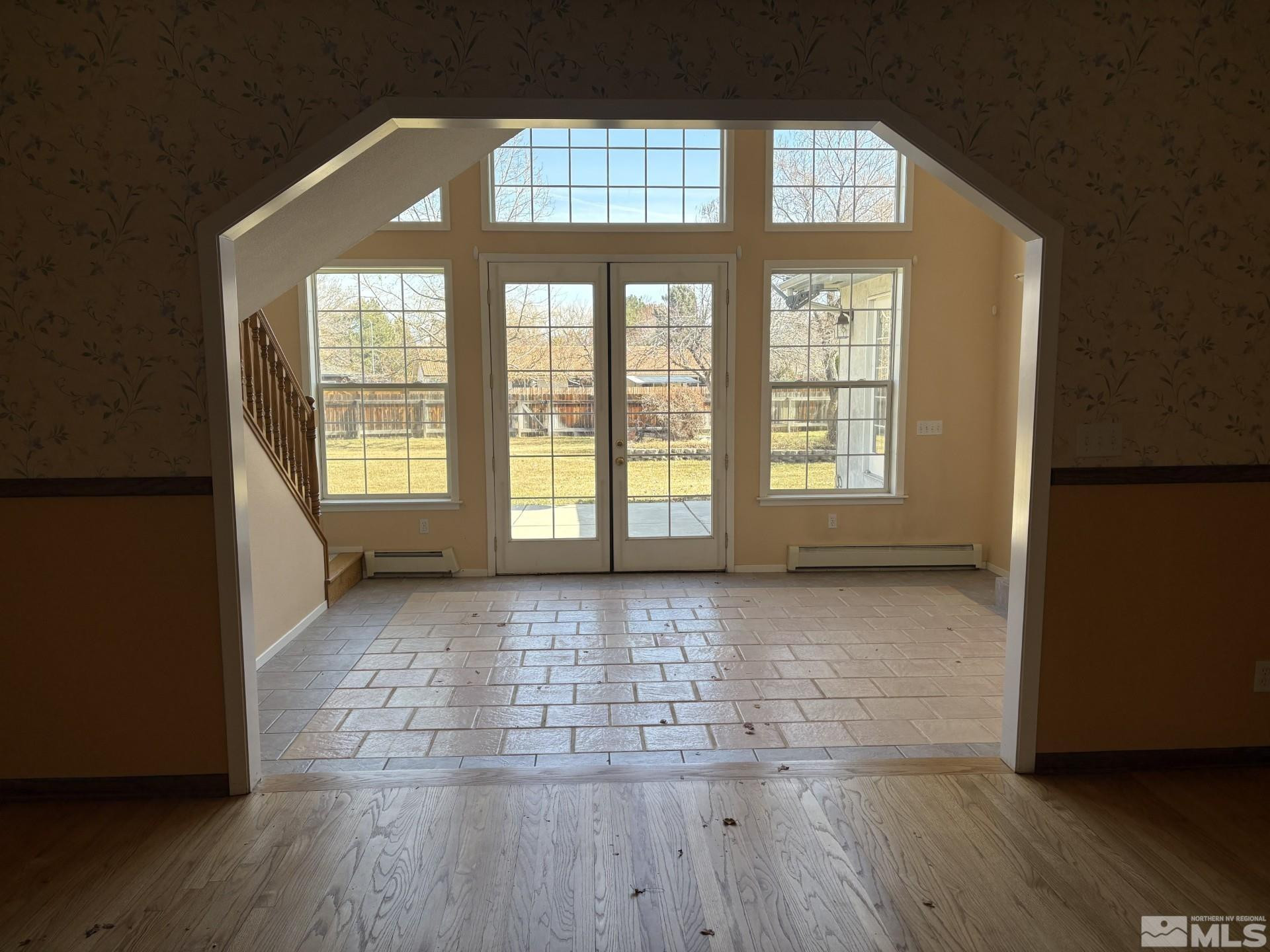 3 Comstock Circle Carson City, NV 89703 - Photo 8 of 30 a view of an empty room with wooden floor and a window