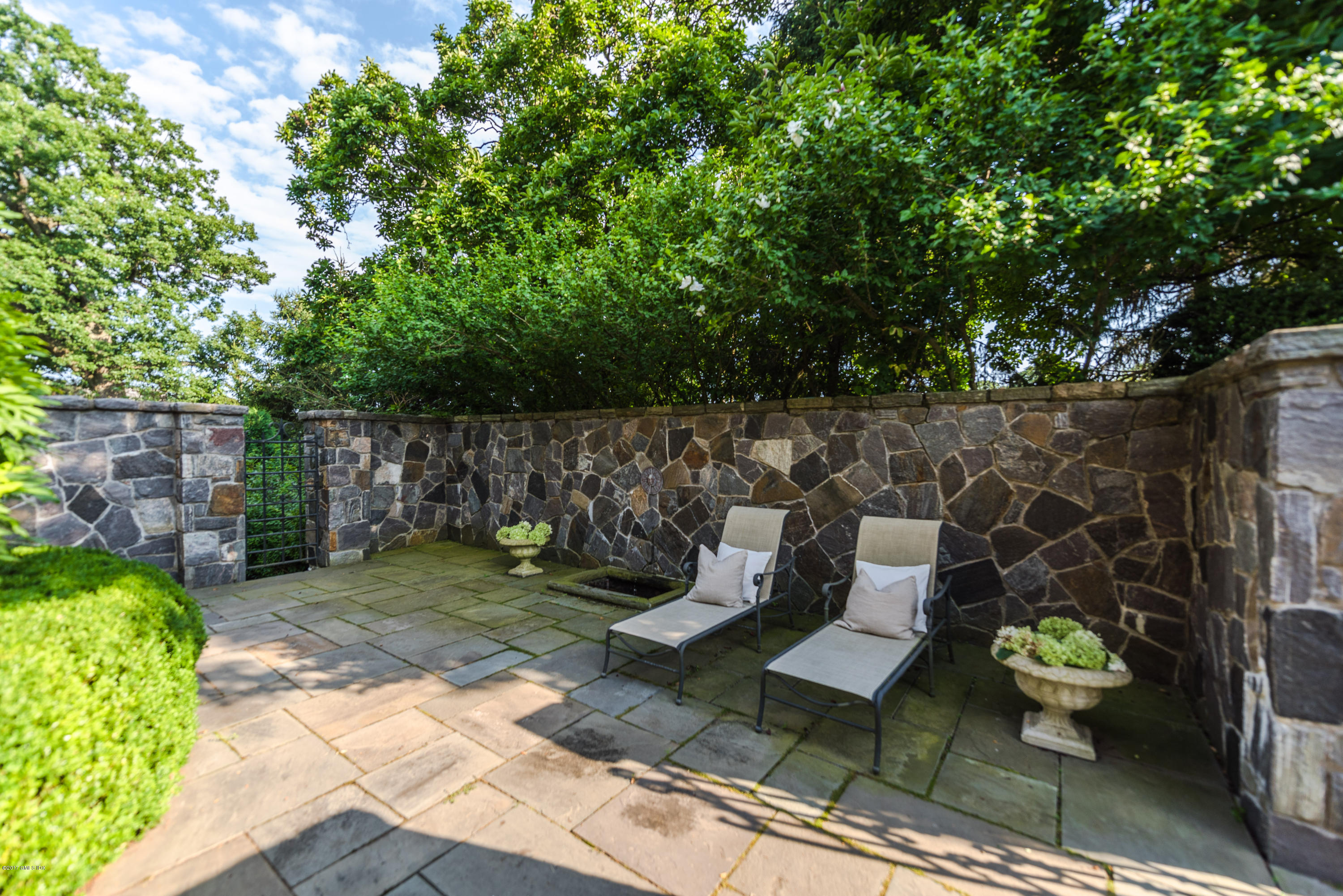 147 Byram Shore Road Greenwich, CT 06830 - Photo 13 of 19 a view of a porch with furniture