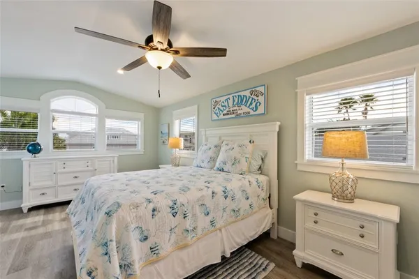 a bedroom with a bed and a dresser