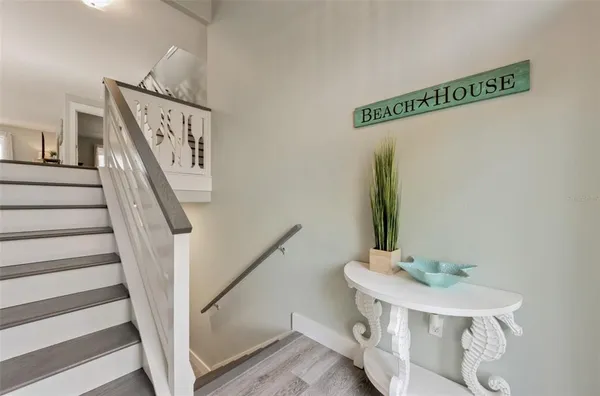 a bathroom with a sink a mirror and a window