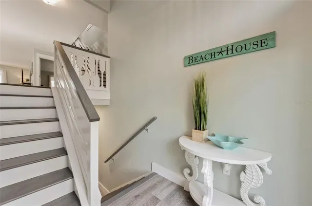 a bathroom with a sink a mirror and a window