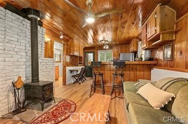 8 Oak Drive Mount Baldy, CA 91759 - Photo 19 of 26 a view of a patio with couches table and chairs and wooden floor