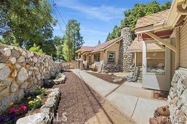 8 Oak Drive Mount Baldy, CA 91759 - Photo 2 of 26 a view of a patio with couches and potted plants