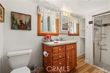 8 Oak Drive Mount Baldy, CA 91759 - Photo 21 of 26 a bathroom with a granite countertop sink toilet and shower