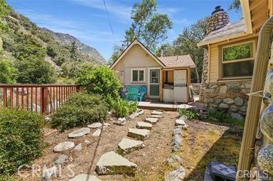 8 Oak Drive Mount Baldy, CA 91759 - Photo 3 of 26 a house view with a outdoor space