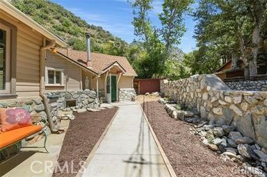 8 Oak Drive Mount Baldy, CA 91759 - Photo 4 of 26 a view of a house with a patio
