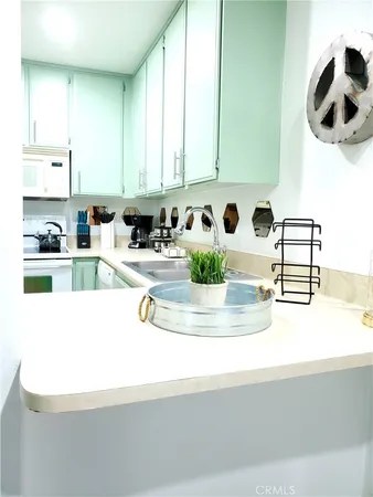 a view of living room with furniture and flat screen