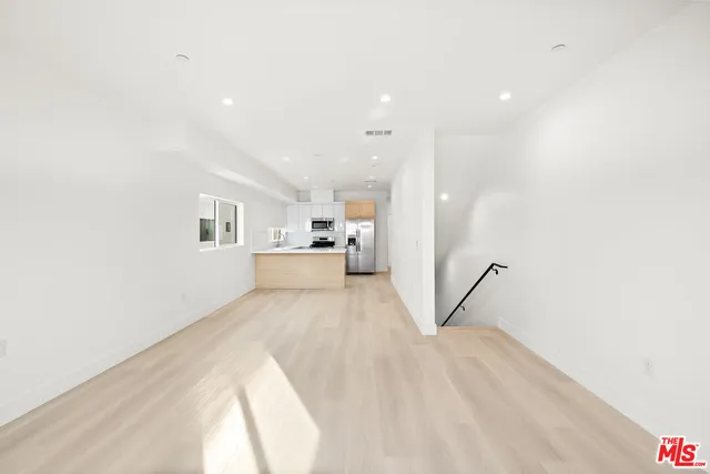 a view of a kitchen with a sink