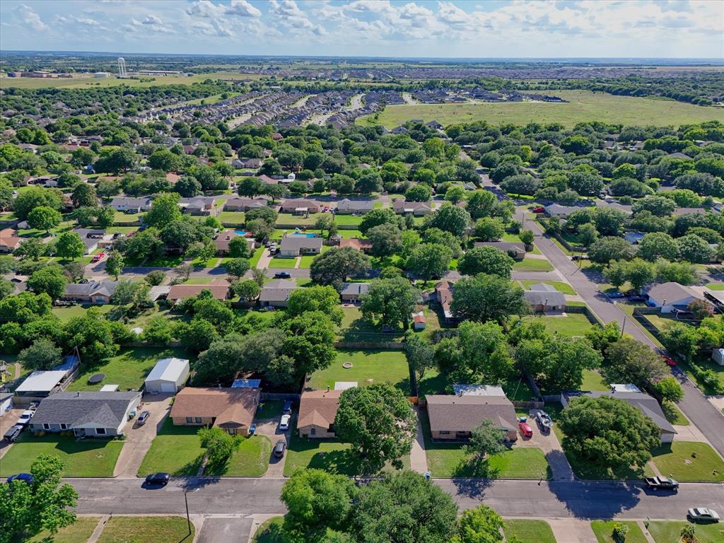 141 Travis Lane Hewitt, TX 76643 - Photo 30 of 31 Expansive residential area featuring numerous single-story homes, mature trees, and manicured lawns