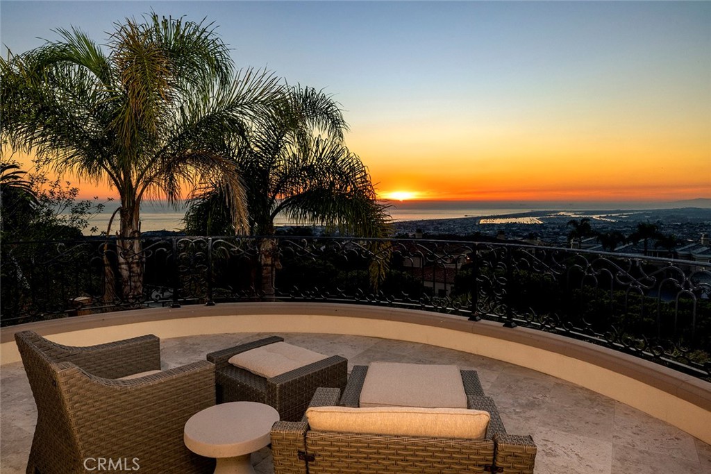 5 Sailview Newport Coast, CA 92657 - Photo 1 of 37 a view of yard with swimming pool outdoor seating