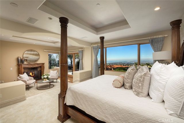 a spacious bathroom with a granite countertop sink and a mirror