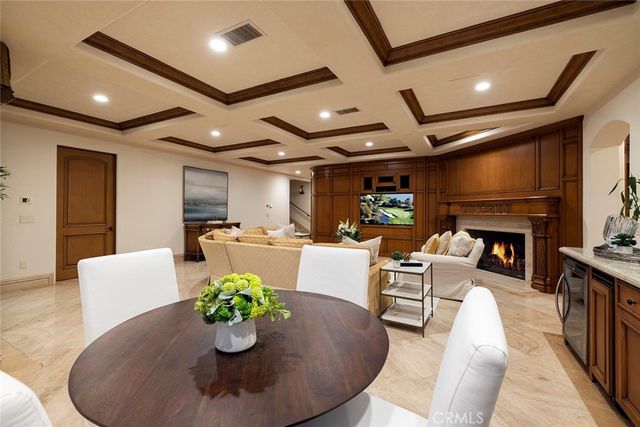 a spacious bedroom with a bed and a large window